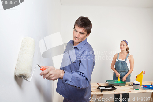 Image of Portrait of young couple painting