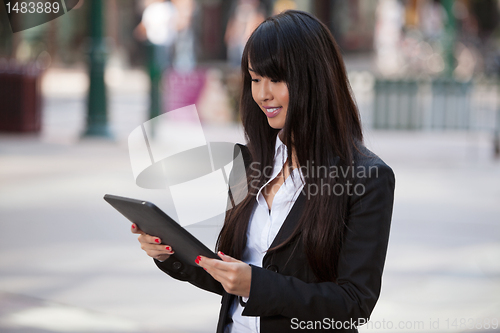 Image of Businesswoman using tablet pc