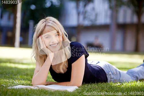 Image of University Girl Studying Outdoors