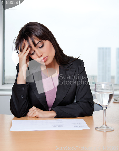 Image of Business Woman Sitting at her Desk