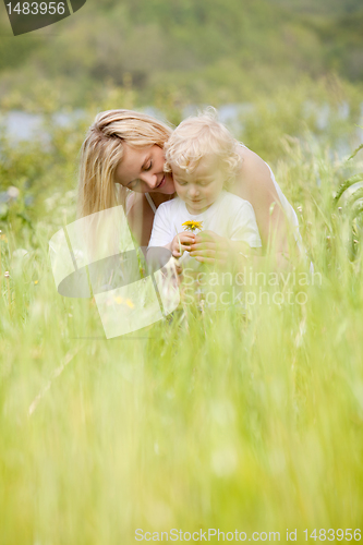 Image of Mother and Son in Green Meadow