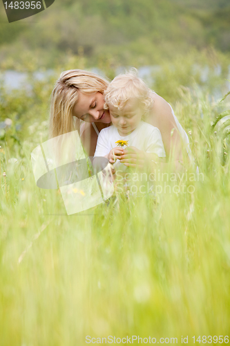 Image of Mother and Son in Green Meadow