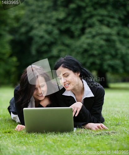 Image of Female Executives Using Laptop