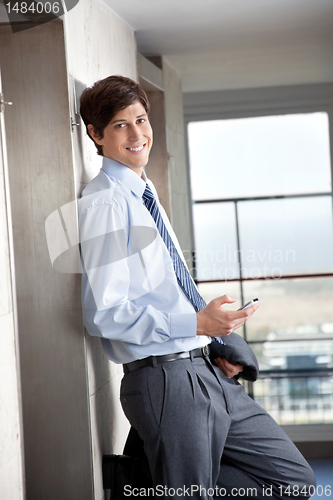 Image of Business Man with Cell Phone