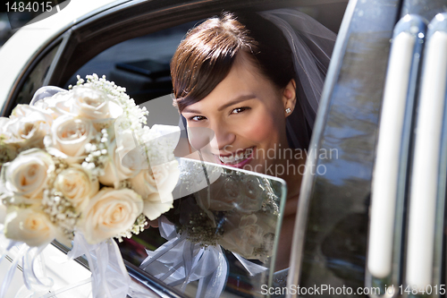 Image of Happy Bride With Flower Bouquet