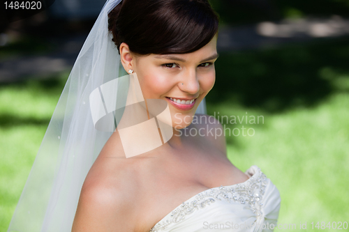 Image of Pretty young bride smiling