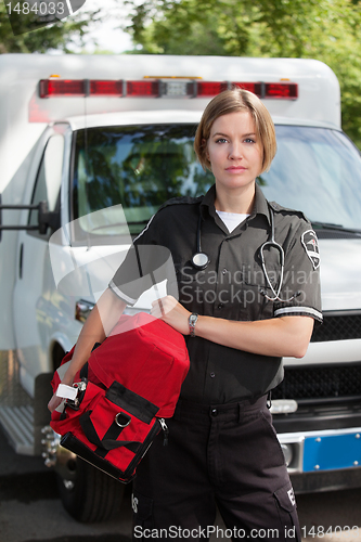 Image of EMS Professional Woman with Oxygen Unit