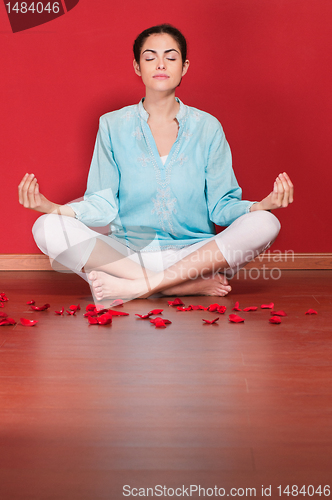 Image of Woman performing yoga