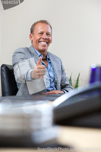 Image of Businessman with thumbs up gesture