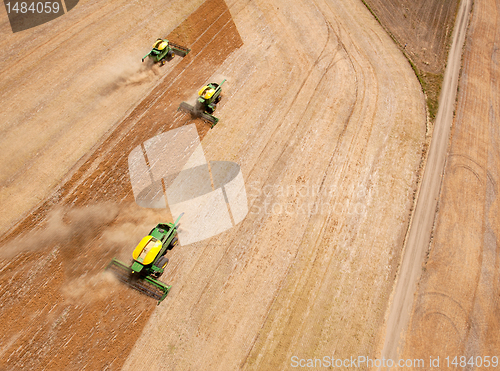 Image of Three Combines in Grain Field