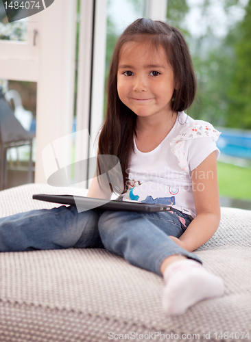 Image of Cute Young Child with Digital Tablet