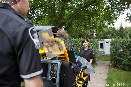 Image of Ambulance Workers with Patient