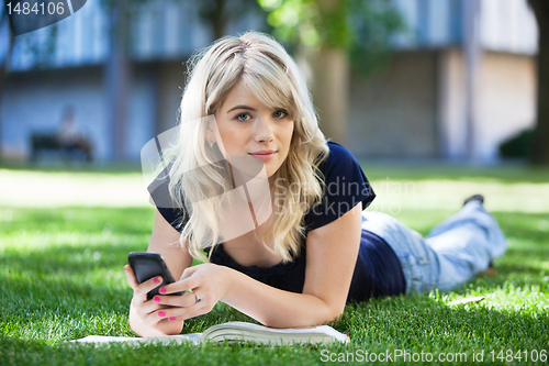 Image of Girl using cell phone