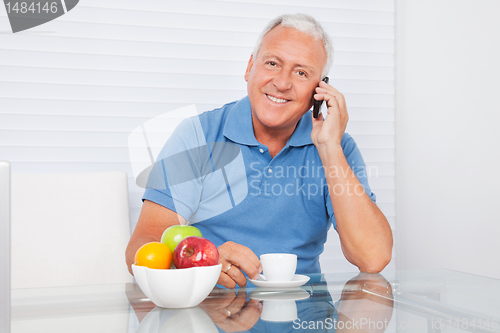 Image of Senior Man Talking on Cell Phone