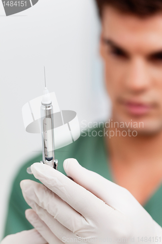 Image of Dentist or Doctor With Needle