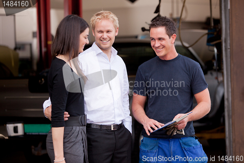 Image of Mechanic with satisfied Customer