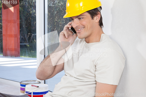 Image of Man talking on the phone