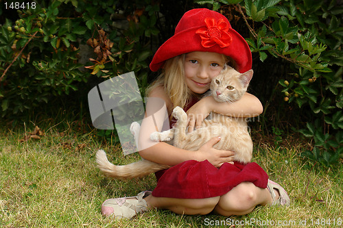 Image of the girl in red hat with a cat