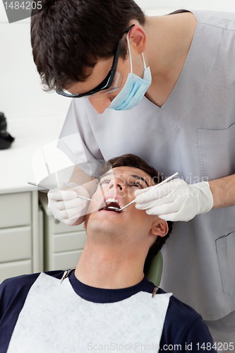Image of Dentist treating patient