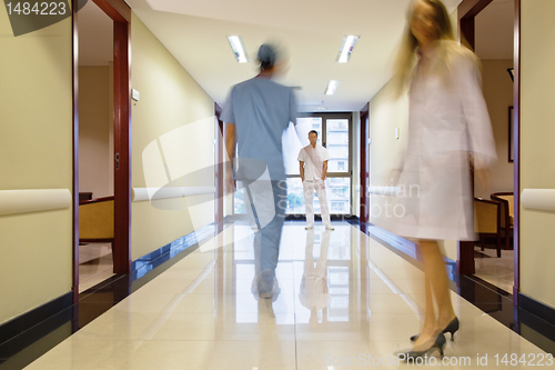 Image of Staff walking in hallway