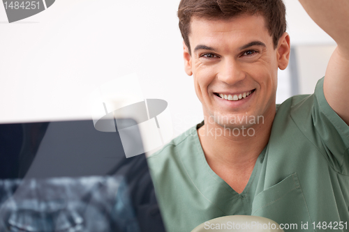 Image of Dentist with X-Ray