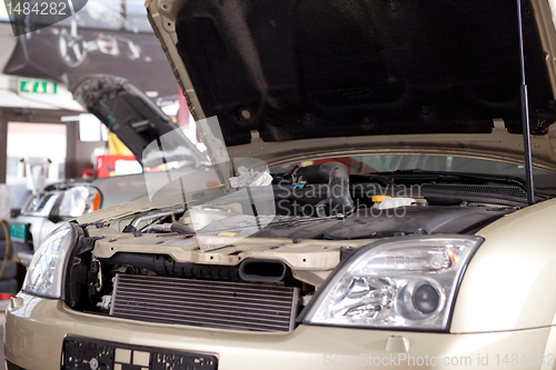 Image of Car in Auto Repair Shop