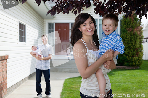 Image of Happy Mother Holding Son