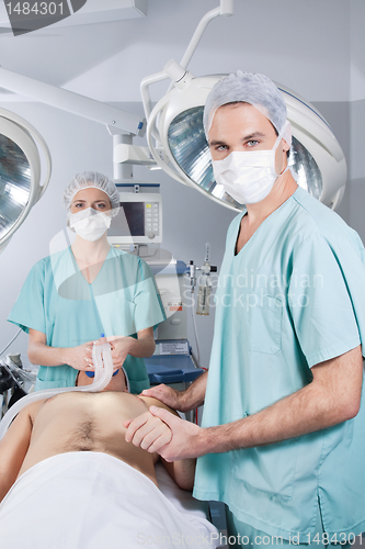 Image of Surgeon nursing the patient