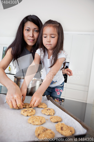 Image of Mother and child making cookies