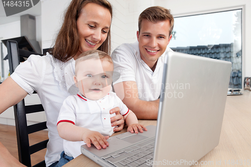 Image of Family with Laptop Computer