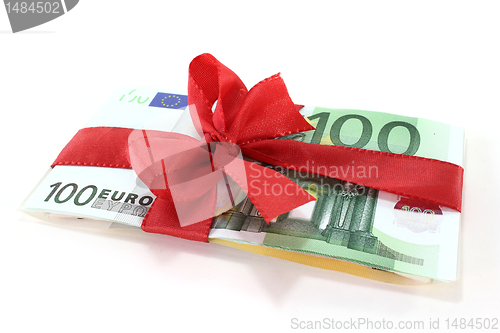 Image of Euro notes with red ribbon