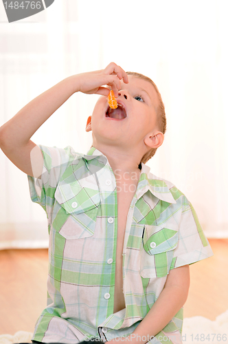 Image of child with orange