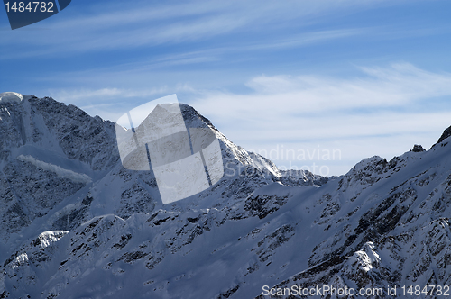 Image of High mountains in winter evening