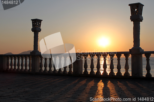 Image of sunrise over quay