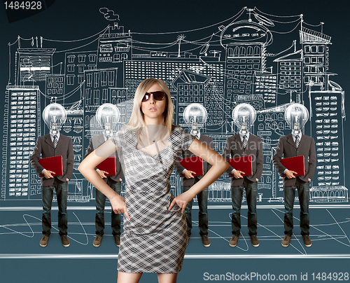 Image of woman and lamp head businesspeople with laptop