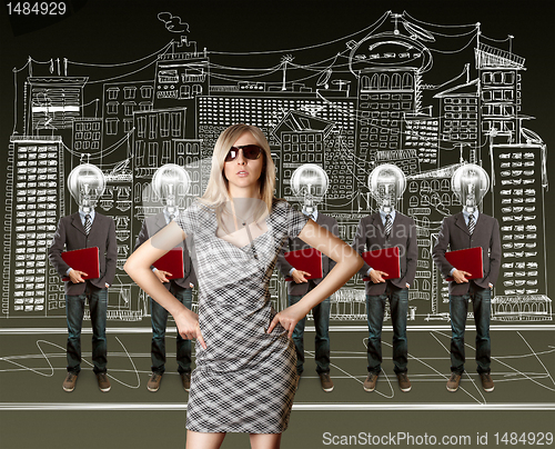 Image of woman and lamp head businesspeople with laptop