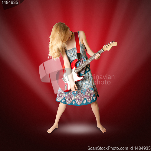 Image of hippie girl with electric guitar