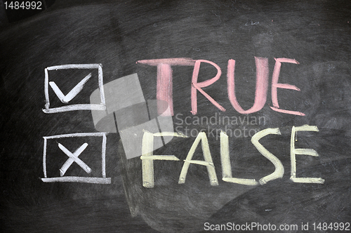 Image of True and false check boxes written on a blackboard