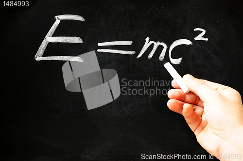 Image of E=mc² Albert Einsteins physical formula on blackboard 