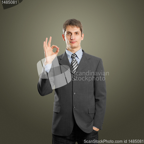 Image of businessman shows OK