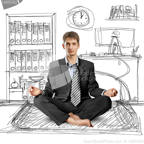 Image of businessman in lotus pose