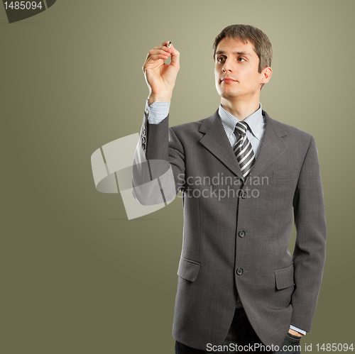 Image of businessman writing something