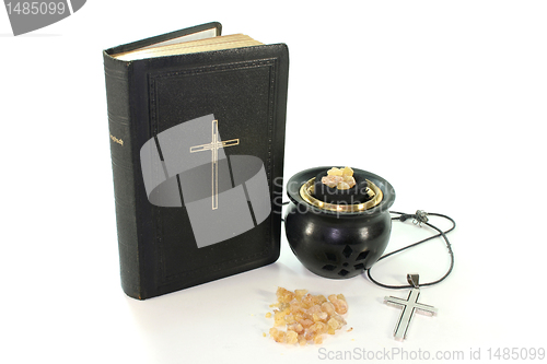 Image of incense with incense bowl and the Bible