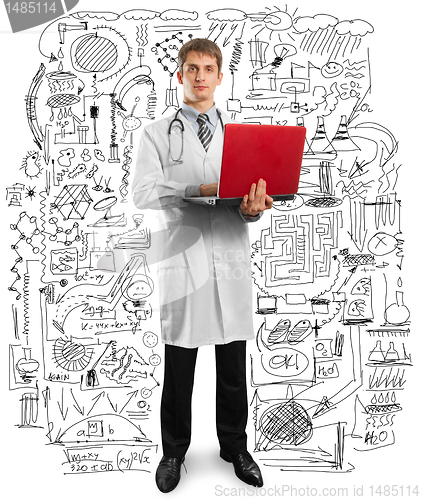 Image of doctor male in suit with laptop in his hands