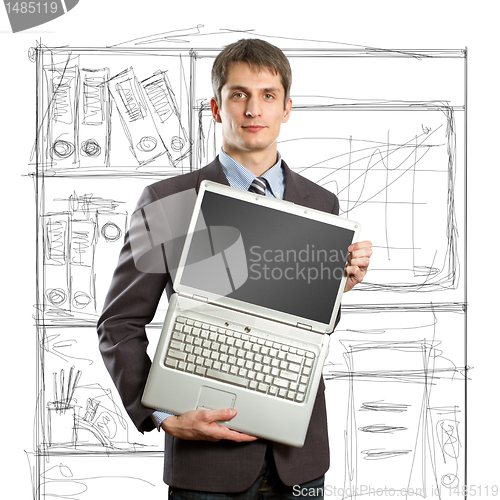 Image of businessman with open laptop in his hands