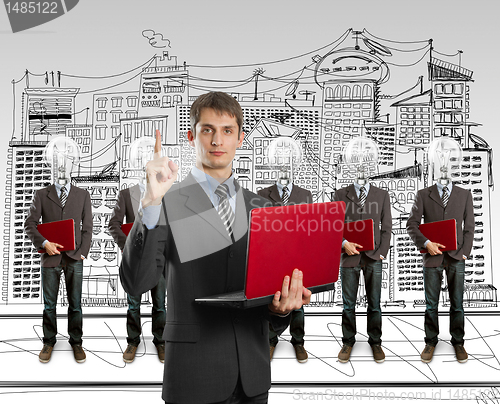 Image of lamp head businesspeople with laptop