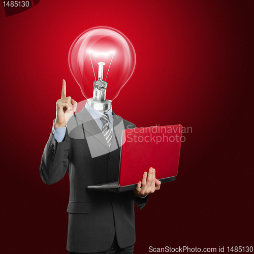 Image of lamp head businessman with laptop