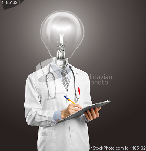 Image of lamphead doctor writing something 