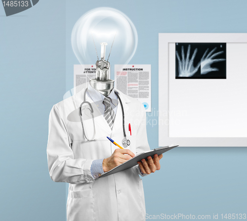 Image of lamphead doctor writing something 