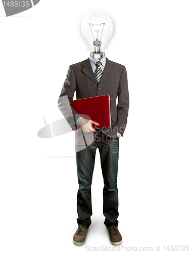 Image of male in suit with lamp and laptop in his hands